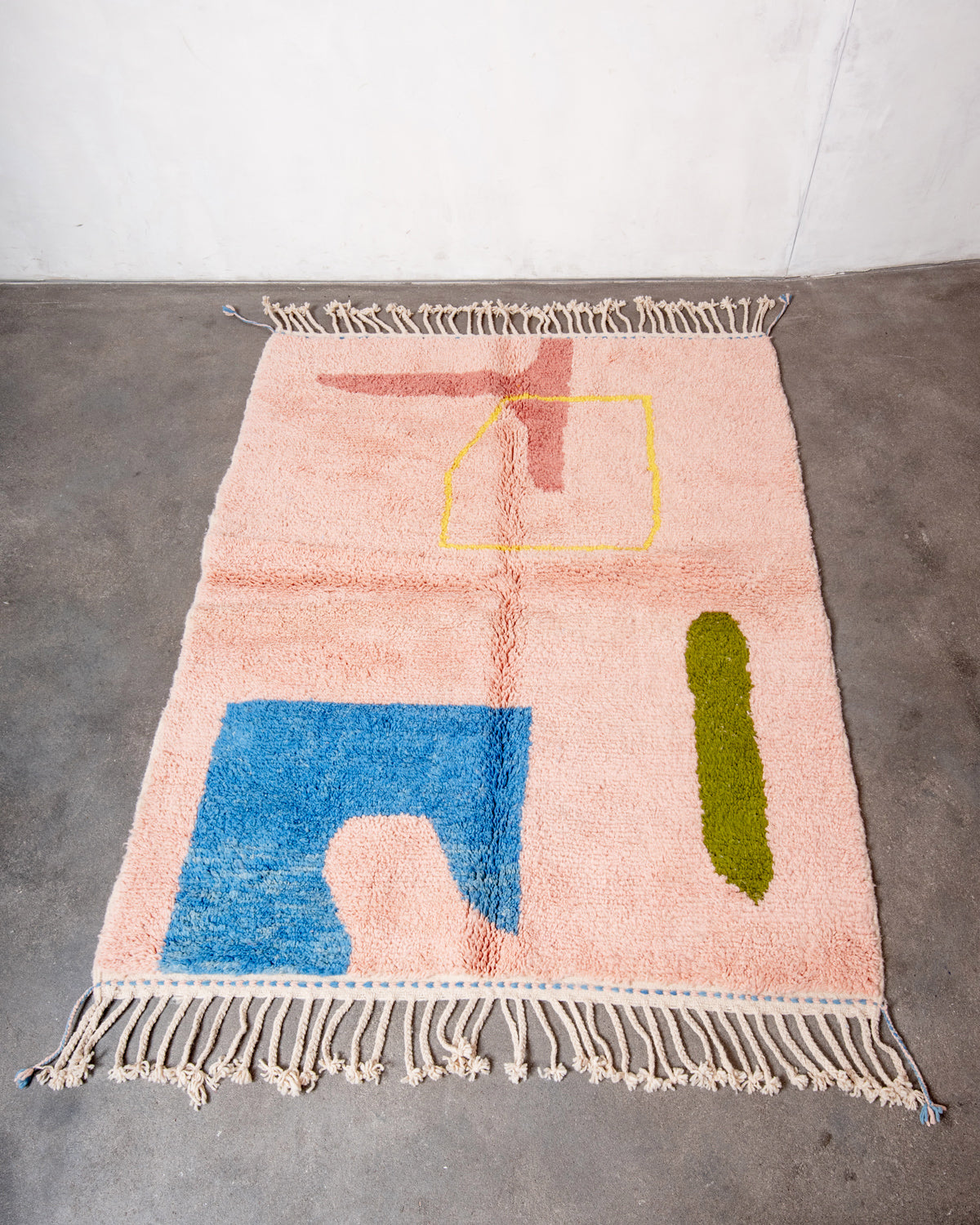 Modern, designer, handcrafted Berber rug from Morocco. Beniourain carpet with beautiful colours and patterns and fluffy wool texture.